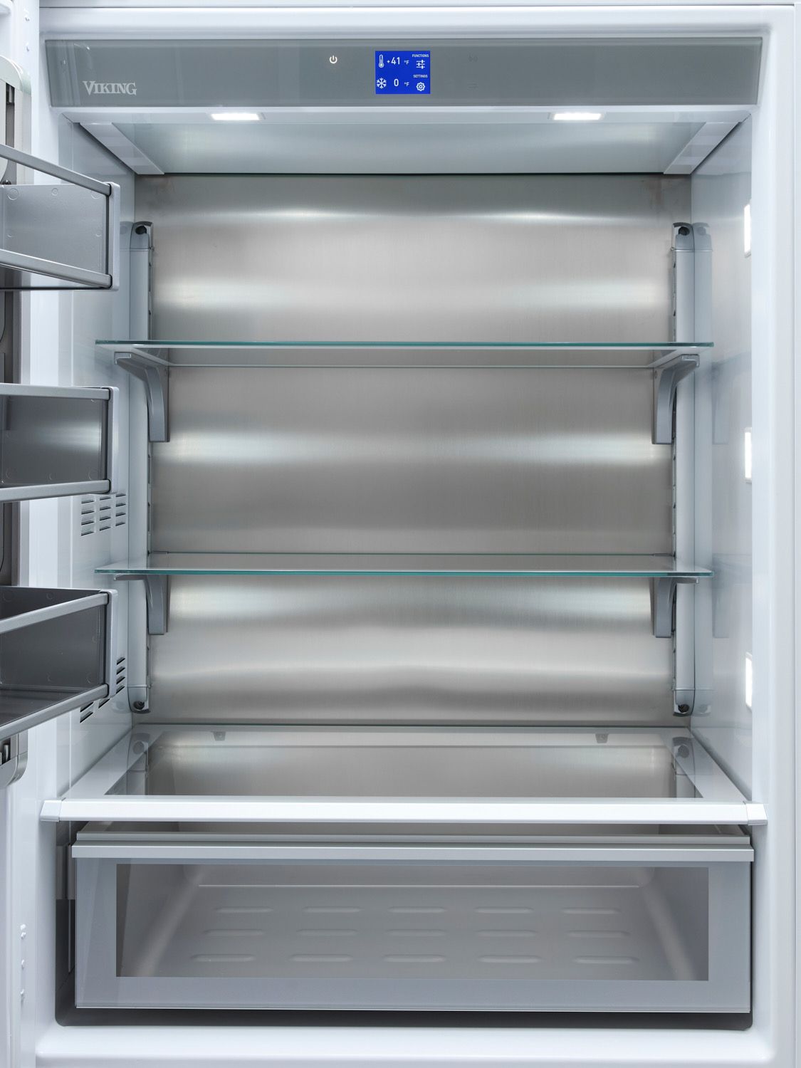 The inside of an empty refrigerator with 2 shelves, large drawer and door storage