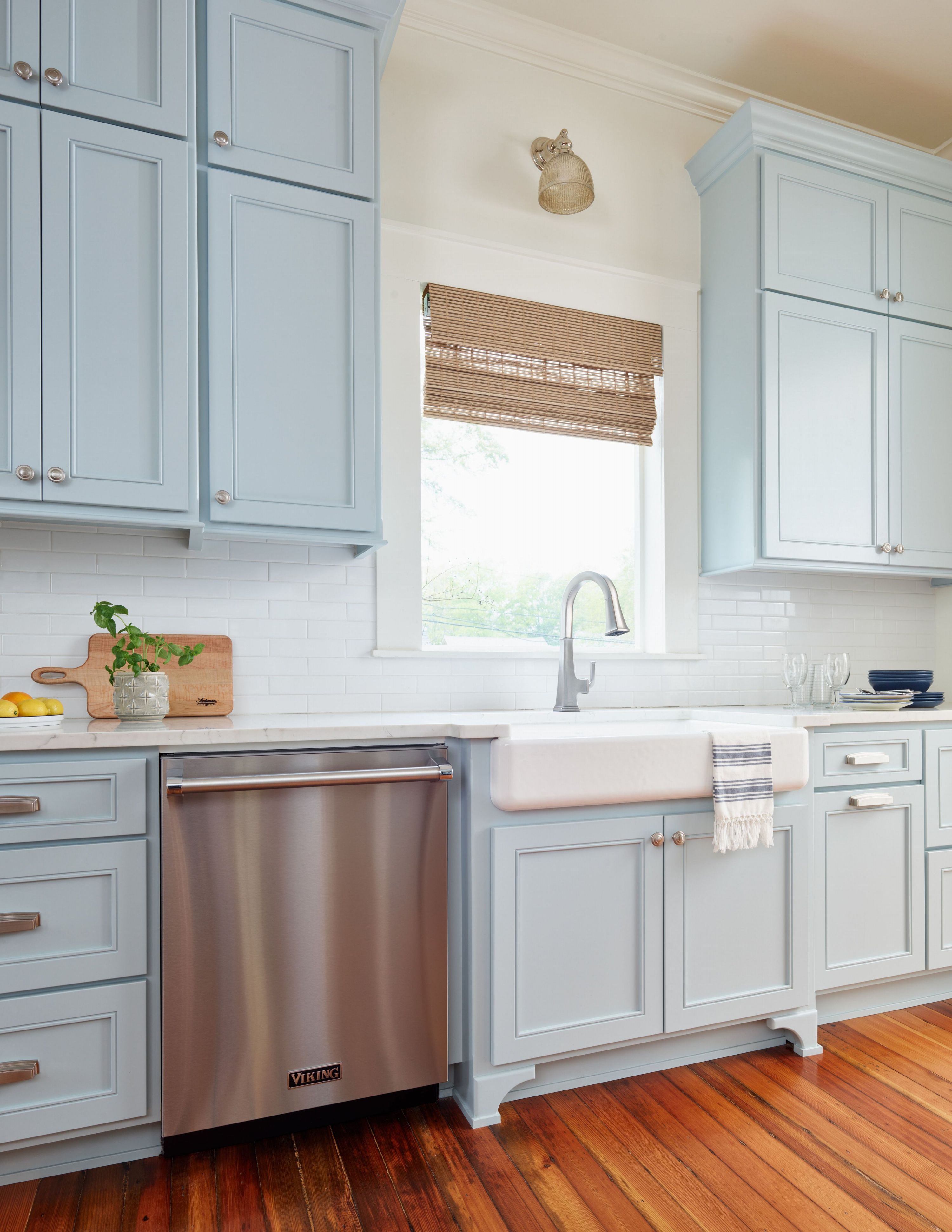 Viking dishwasher in a kitchen with baby blue cabinets